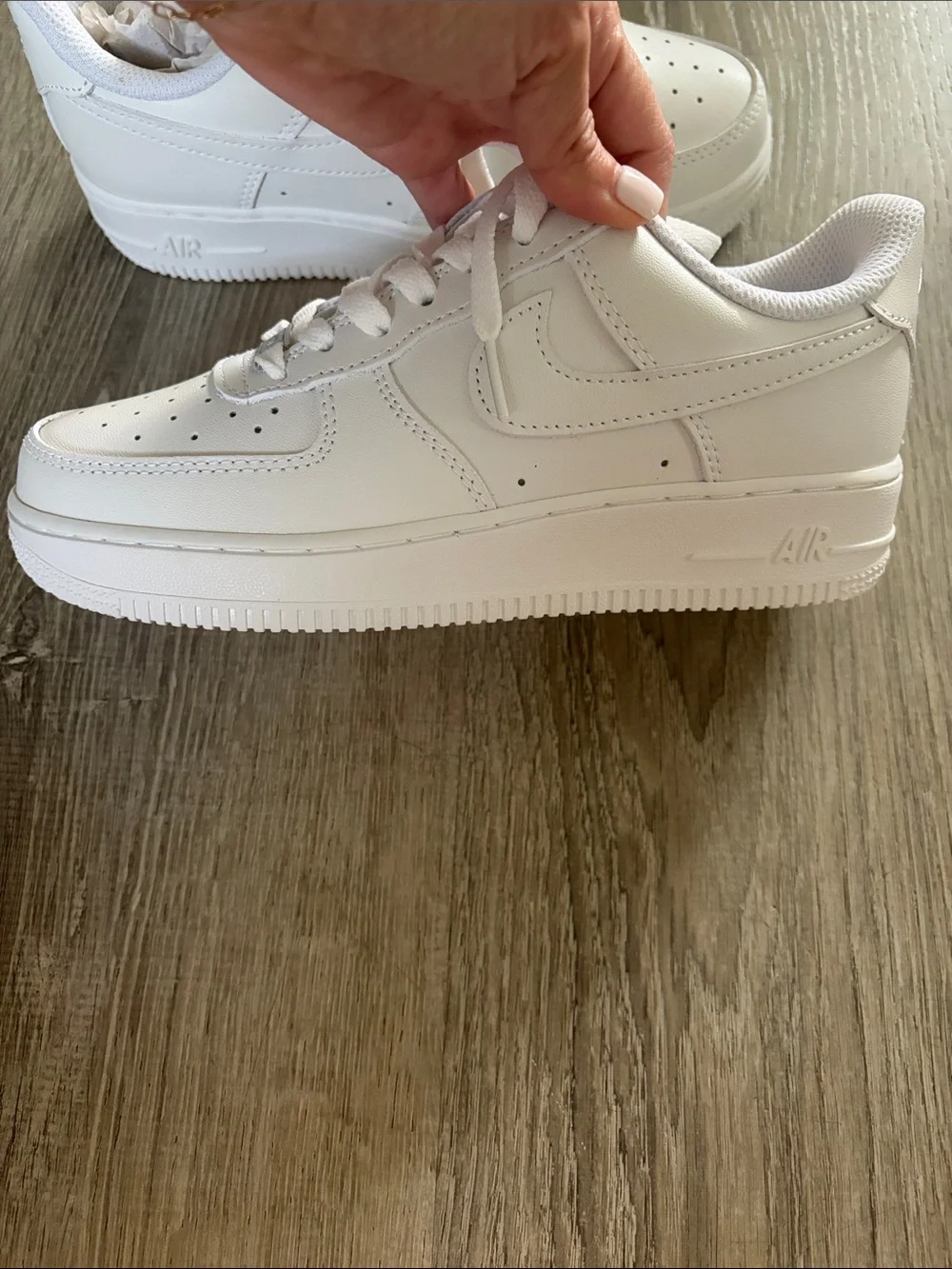 Air Force 1’s Men’s White Low-Top Sneakers